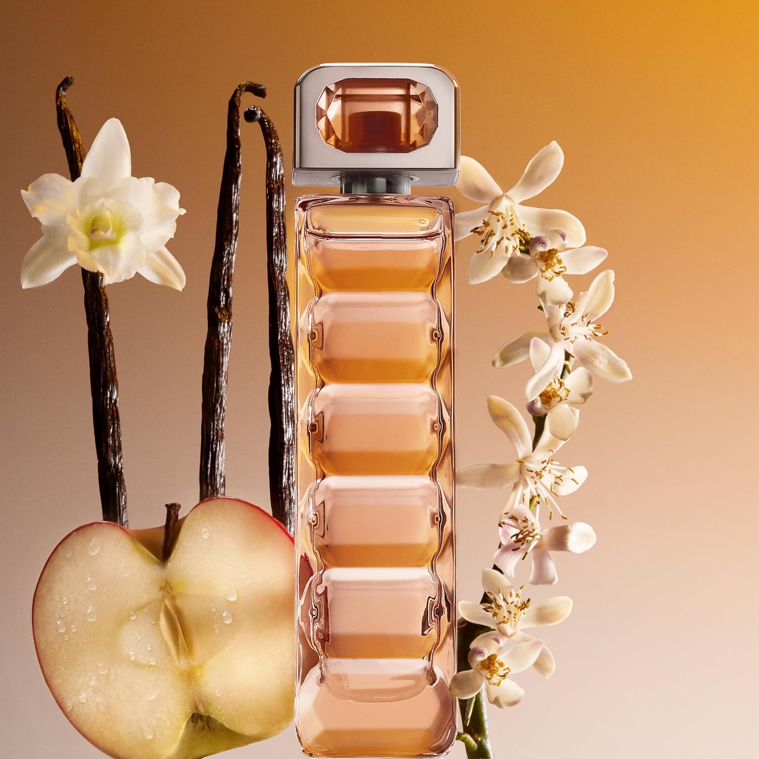 Detalle de Boss Orange Eau de Parfum da donna 50 ml: mela, bergamotto e vaniglia cremosa