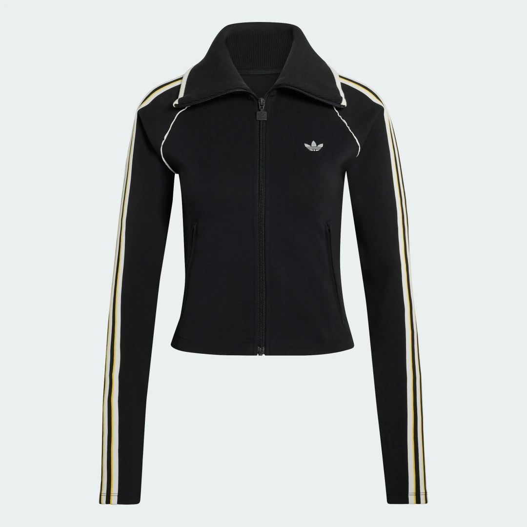 Detalle 2 de CHAQUETA DEPORTIVA ENTALLADA FIREBIRD de Adidas: minimalismo práctico para entrenos y casual