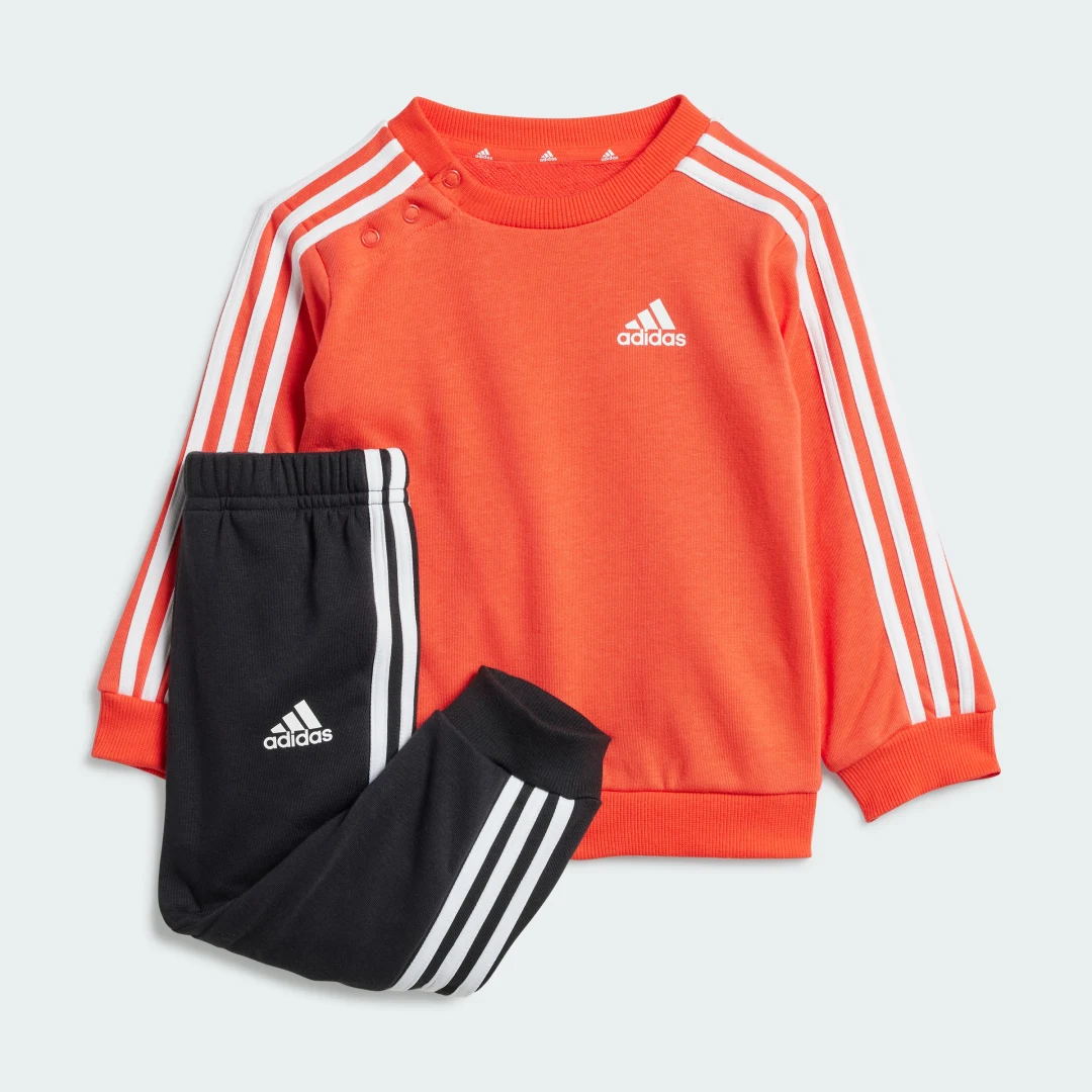 Detalle de Conjunto Essentials 3 bandas (Bebé) de Adidas — sudadera y pantalón naranja