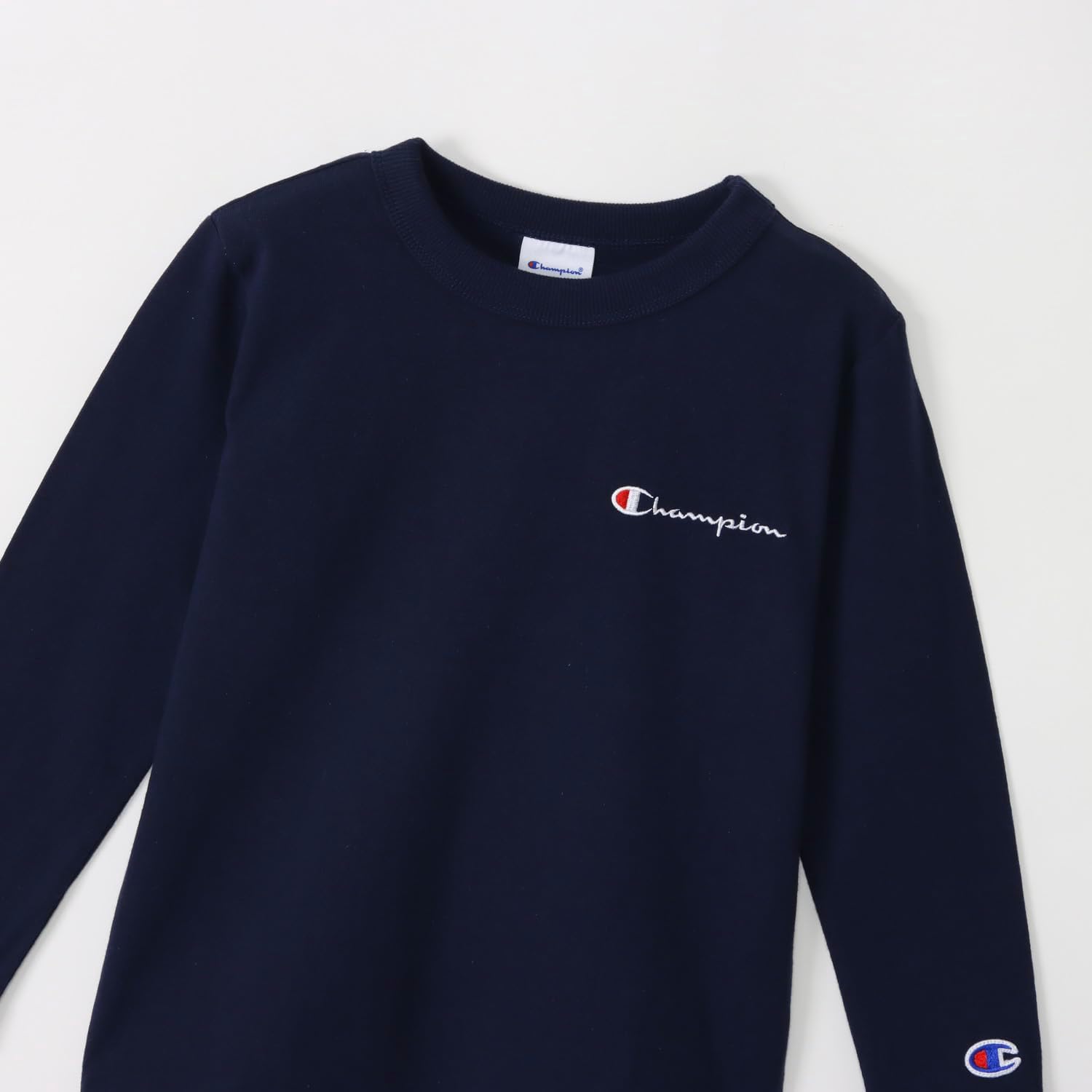 Detalle de Champion CKSY404Z キッズ長袖Tシャツ 綿100%・バインダーネック・胸ロゴ刺繍