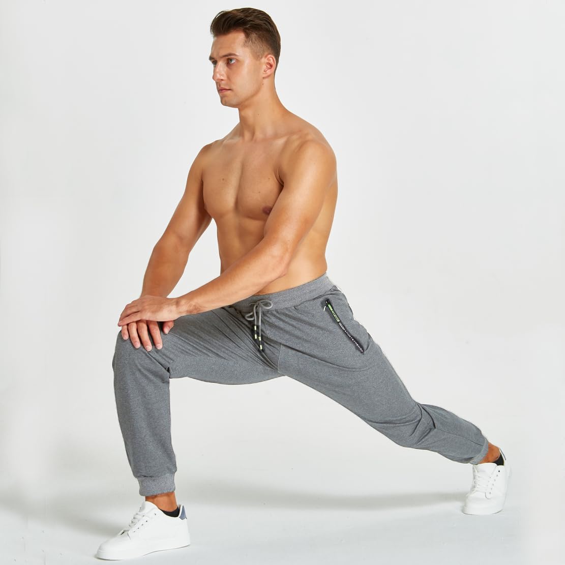 Detalle de ZOXOZ pantaloni sportivi uomo in cotone con elastico in vita e tasche con zip