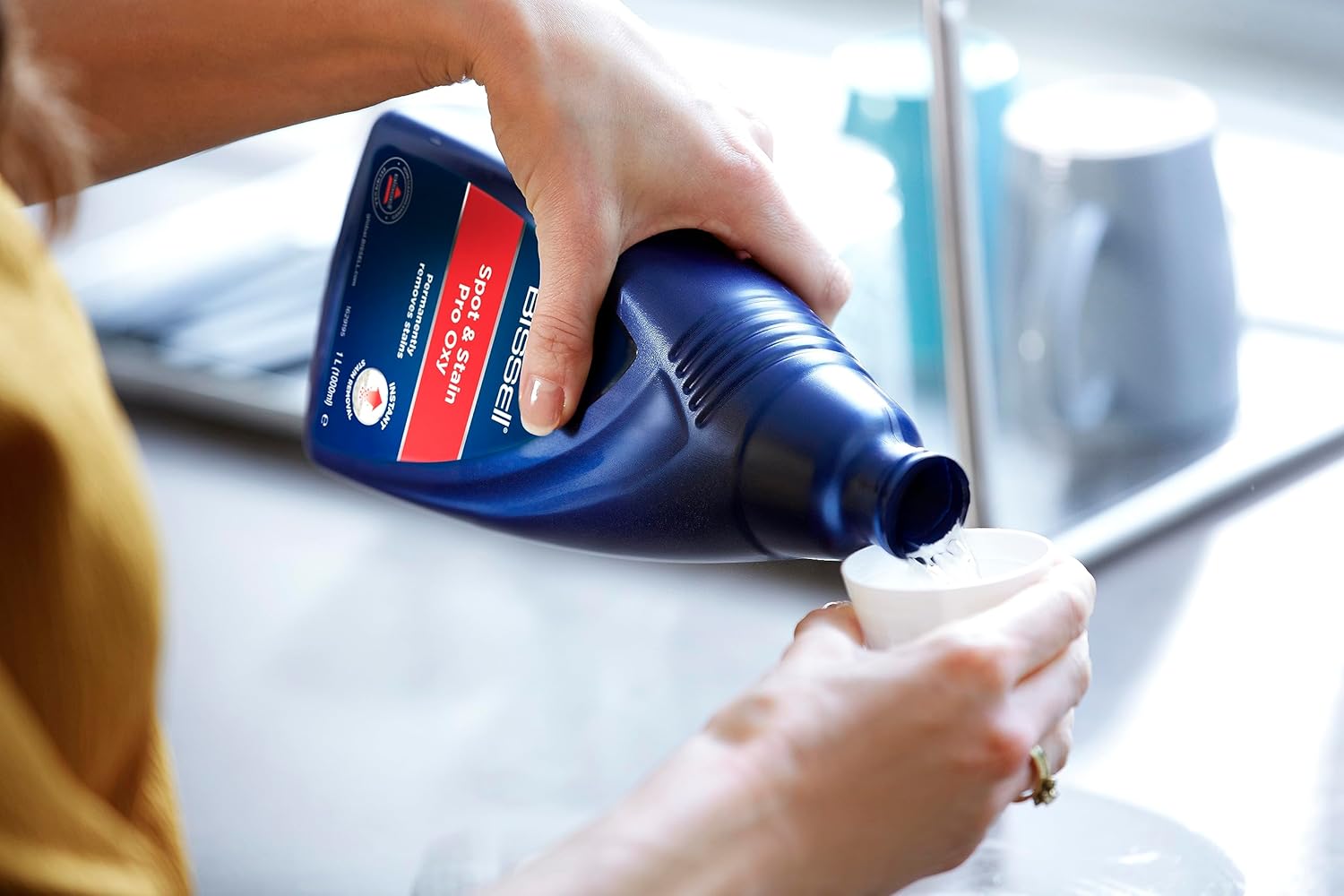 Detalle de BISSELL Spot & Stain Pro Oxy: Soluzione detergente per tappezzeria e tappeti portatili, 1L
