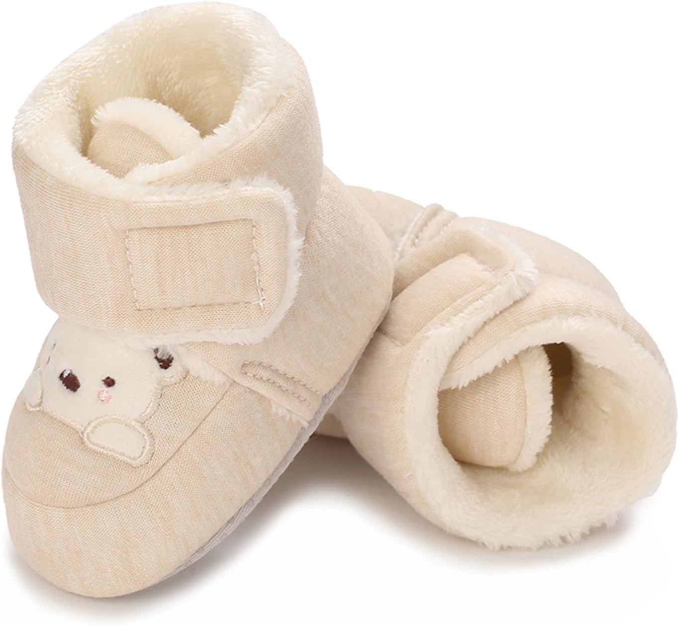 Detalle de RVROVIC plush winter snow boots for babies and toddlers with anti-slip sole and bowknot detail