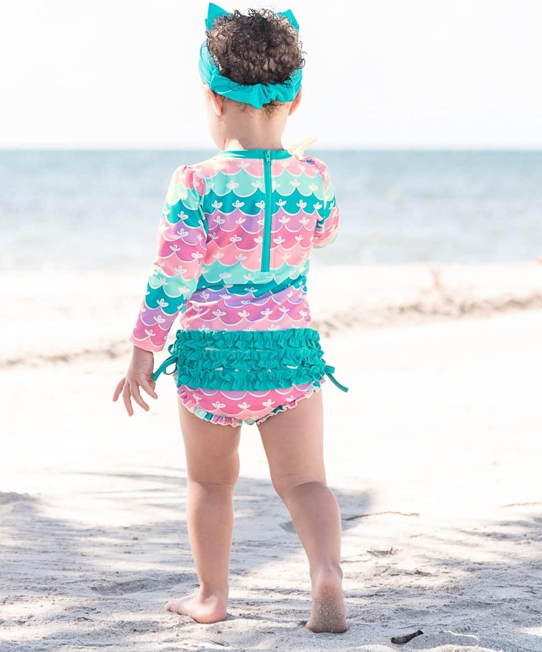 Detalle 2 de RuffleButts UPF 50+ Baby Girl Swimsuit