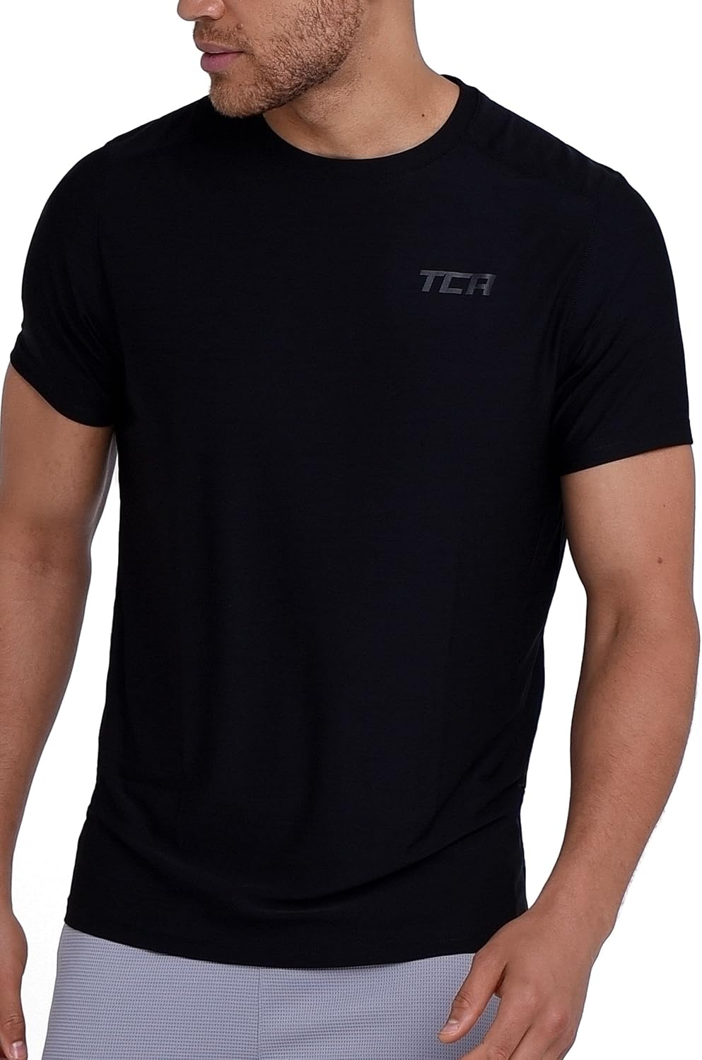 Detalle de TCA Galaxy Maglietta Palestra Uomo - Maglia Running a Maniche Corte, stile spacedye e tecnologia D.R.Y. per allenamenti comodi