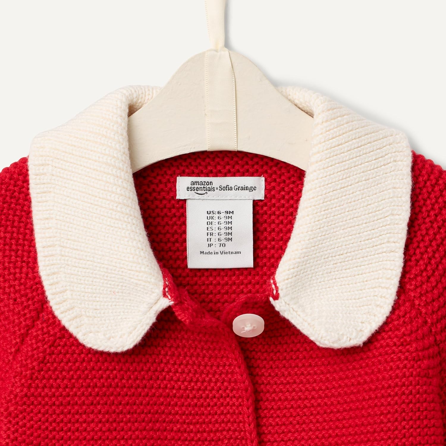 Detalle de Amazon Essentials x Sofia Grainge Unisex Toddlers and Babies' Peter Pan Collar Sweater Jacket