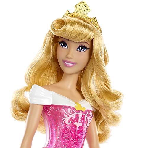 Detalle de Mattel Disney Princess Aurora: bambola snodata con capa, coroncina e accessori scintillanti (HLW09)