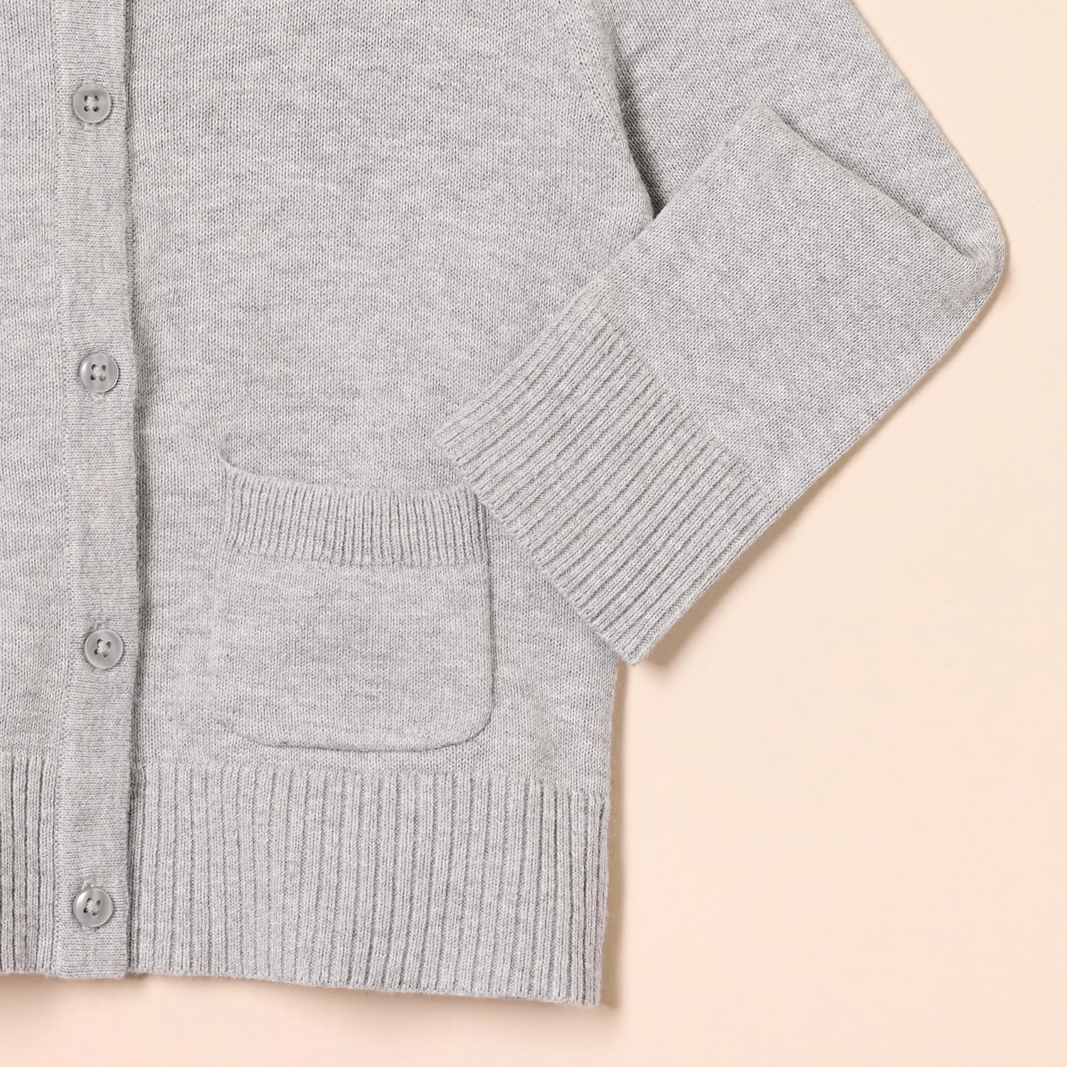 Detalle 1 de Uniform slim fit cardigan sweater for girls