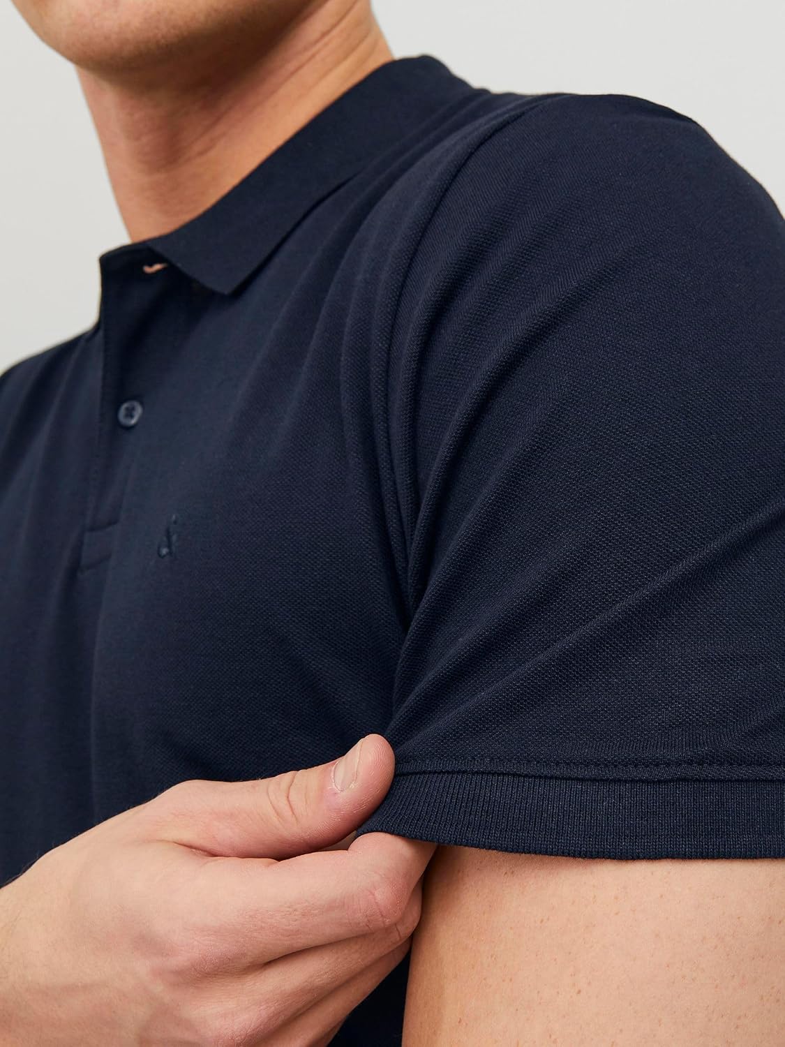 Detalle de JACK & JONES Herren Poloshirt Einfarbig aus Baumwolle