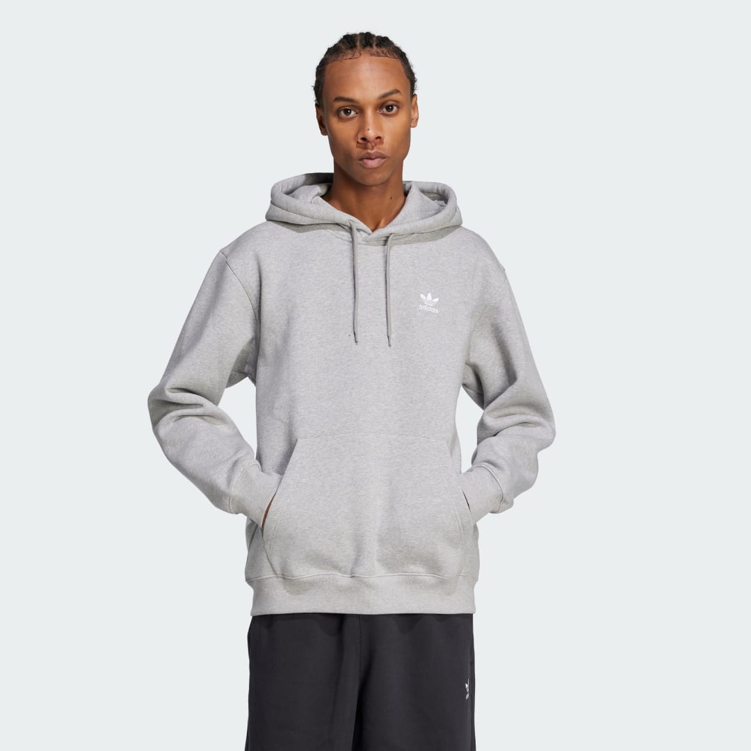 Detalle de Sudadera holgada con capucha Trefoil Essentials de Adidas (gris) – comodidad y estilo all‑round