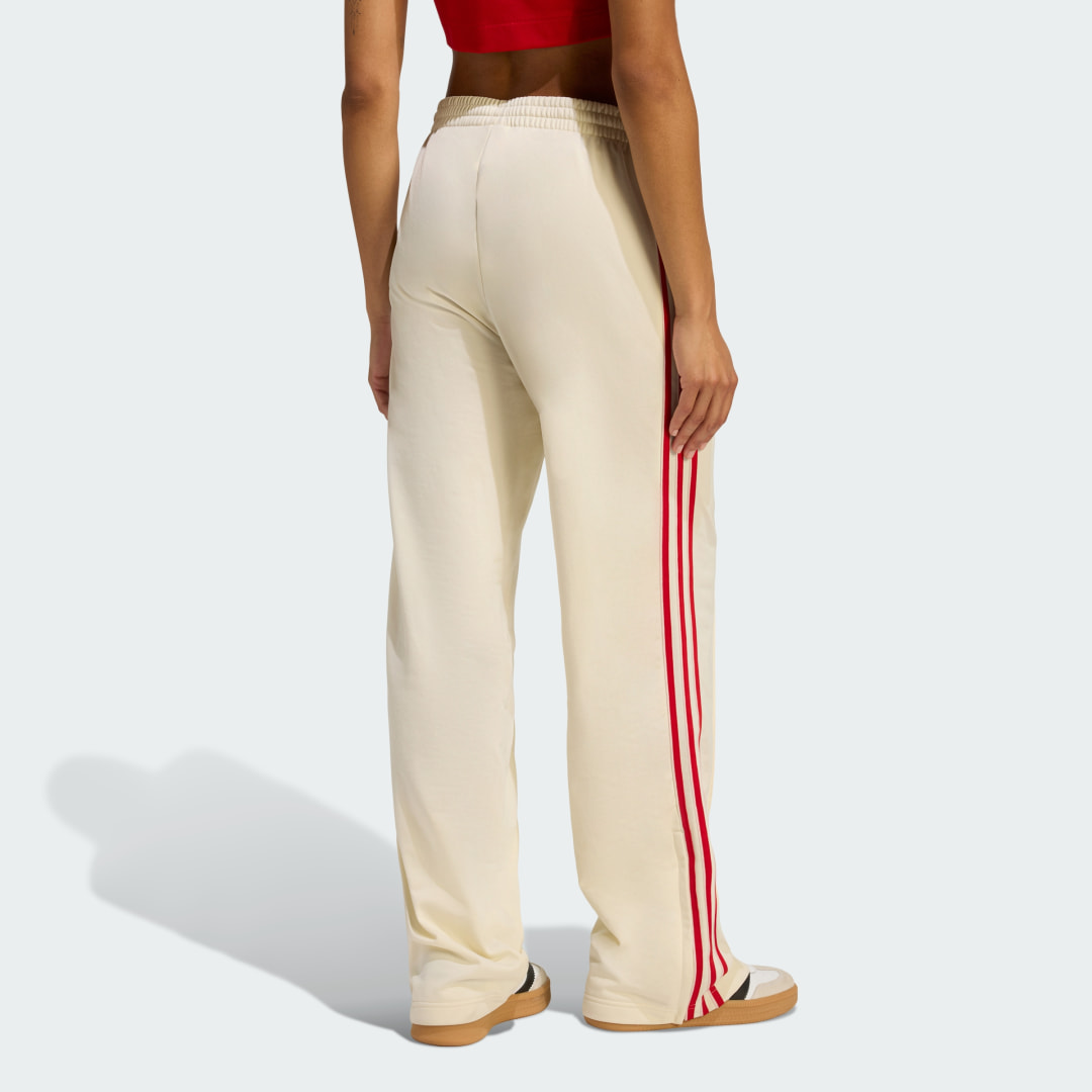 Detalle 2 de PANTALÓN HOLGADO FIREBIRD de Adidas - mirada moderna a un clásico blanco