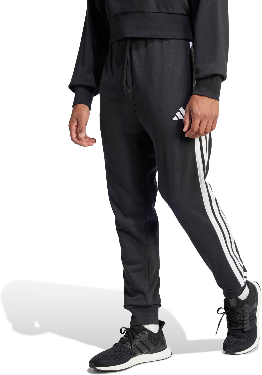 Detalle de adidas Essential Three Stripes French Terry Pant 70% recycelt