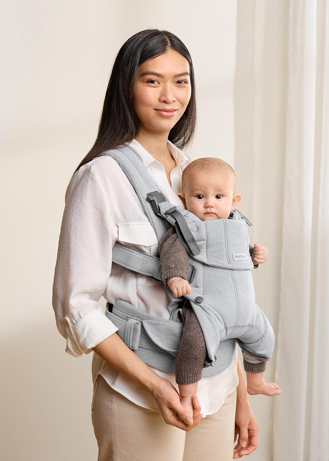 Detalle 2 de BabyBjörn Harmony Marsupio in Tessuto Mélange Grigio Chiaro — comfort 0–3 anni