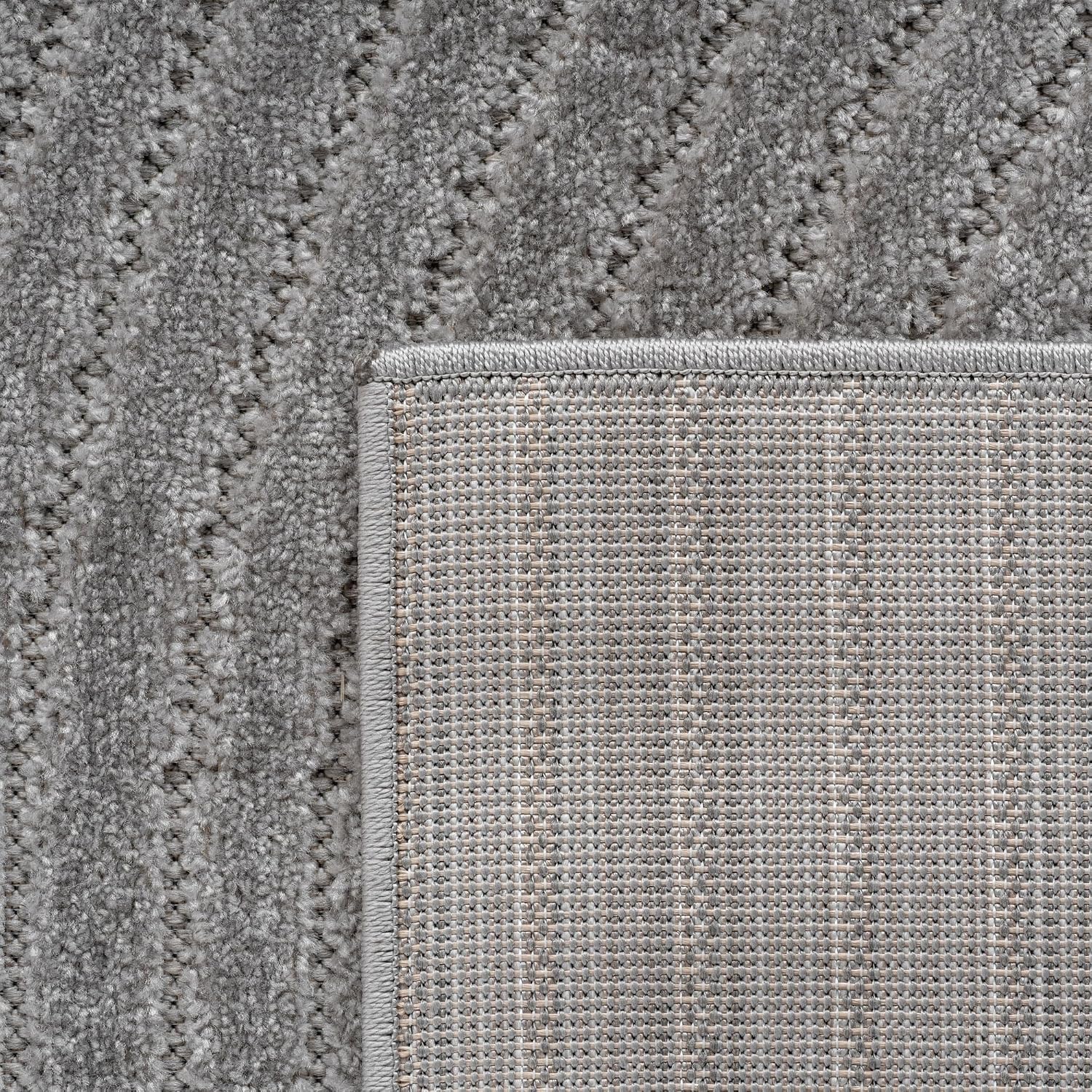Detalle 2 de SIMPEX Outdoor Teppich wetterfest 200x290 cm – Kurzflor mit Hoch-Tief-Effekt, grau