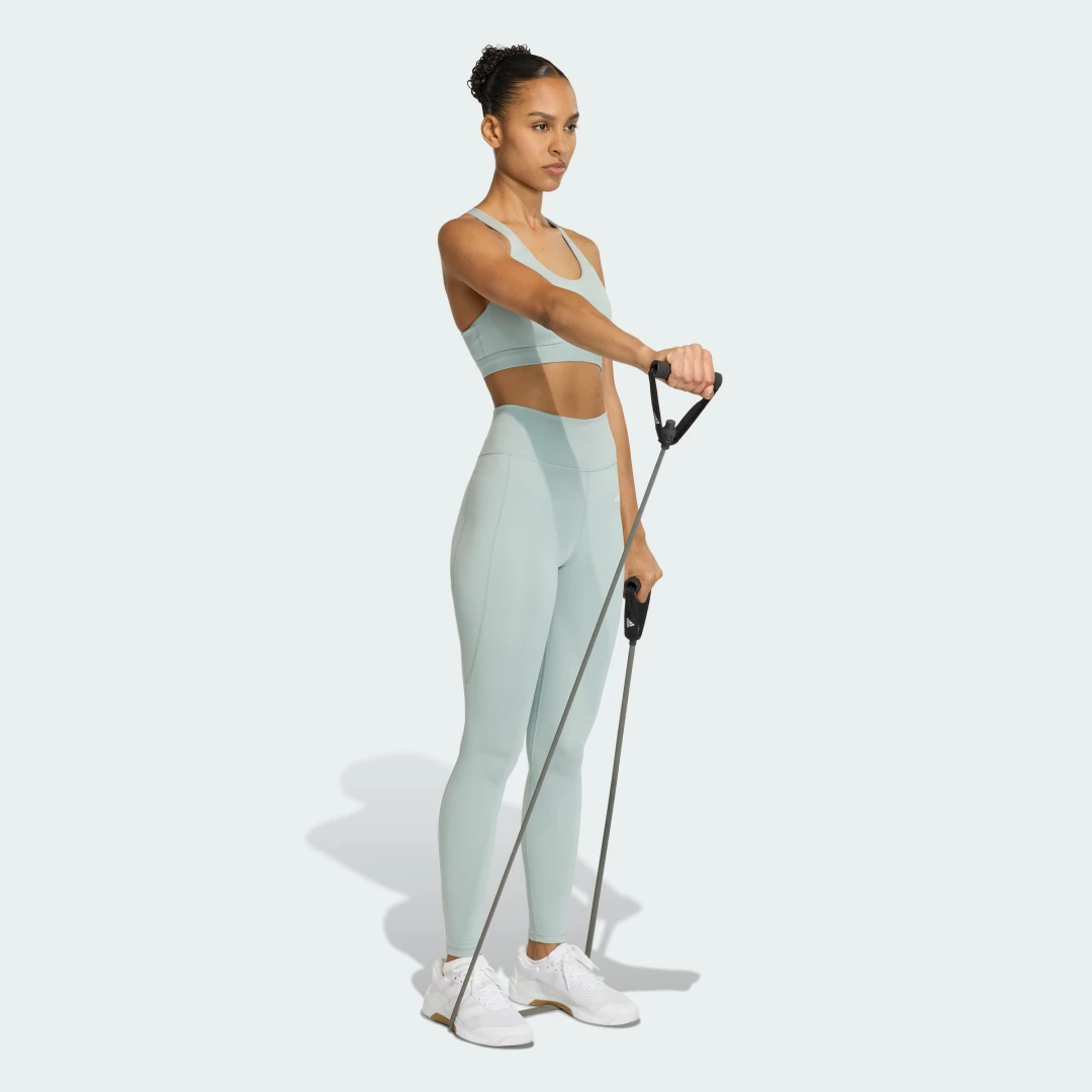 Detalle de Sujetador de entrenamiento para alto impacto Optime Essentials de Adidas (verde)