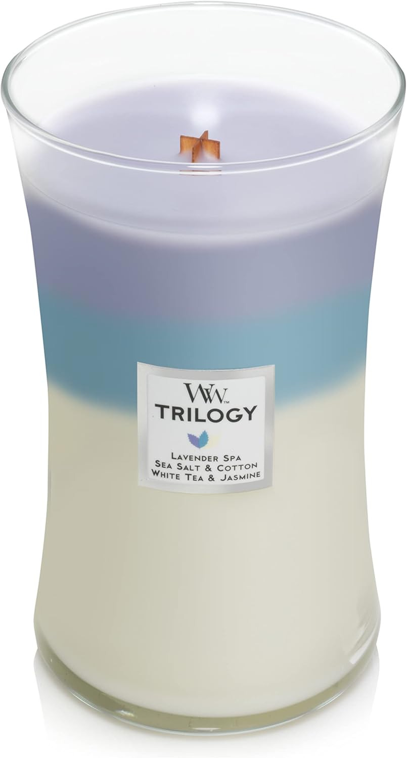 Thumbnail 1 de WoodWick Trilogy grande bougie jarre parfumée Séjour au calme – Lavande relaxante, Sel marin & Coton, Thé blanc et Jasmin