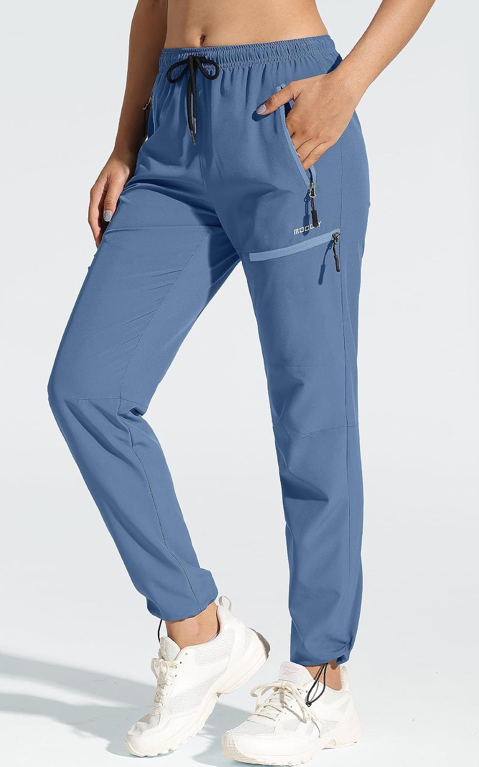 Detalle de MOCOLY Pantalon Randonnée Femme Léger à Séchage Rapide et Imperméable – Poches zippées et UPF 50