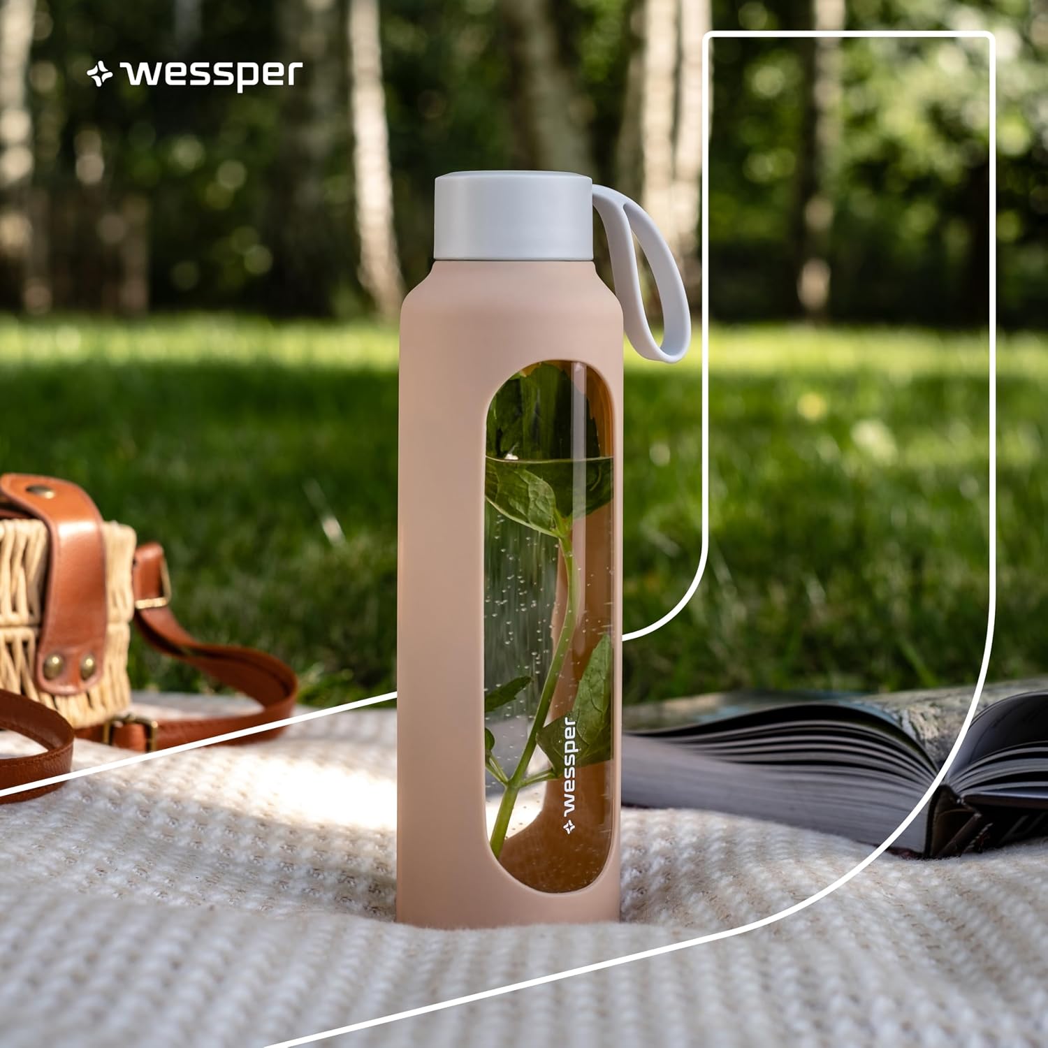 Detalle de Wessper WES260 glazen drinkfles 500 ml met hydratatieschaal en siliconenhoes