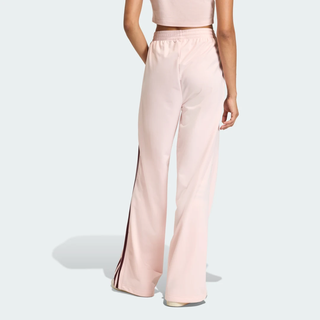 Thumbnail 1 de Pantalón holgado Firebird de Adidas: comodidad y estilo en rosa para tu día a día