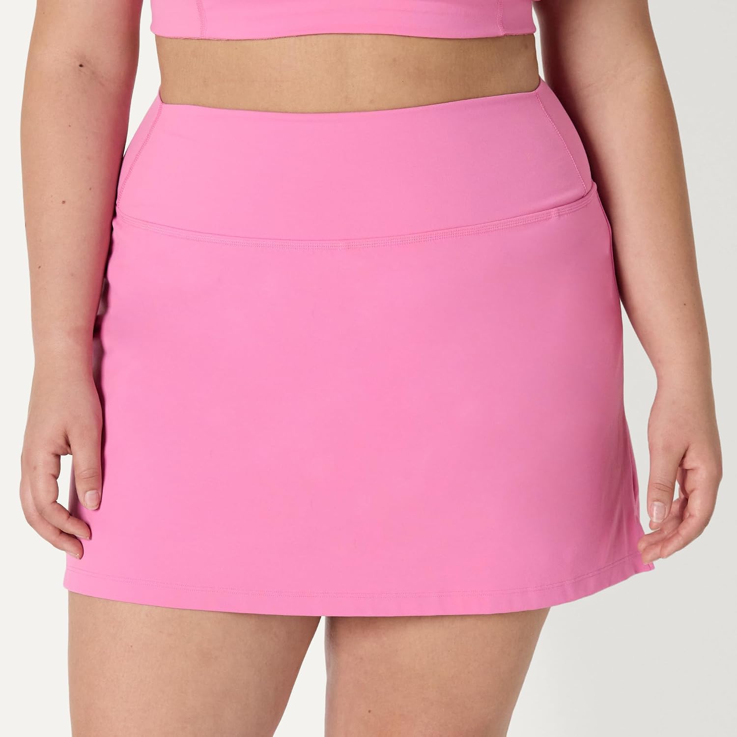 Detalle de Amazon Essentials Damen Active FormFlex Buttery Soft Tennisrock mit integrierter Shorts und Taschen