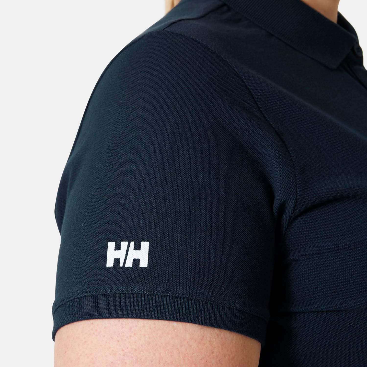 Detalle de Helly Hansen Donna Polo Crew Pique 2: polo in cotone organico per un look femminile e versatile