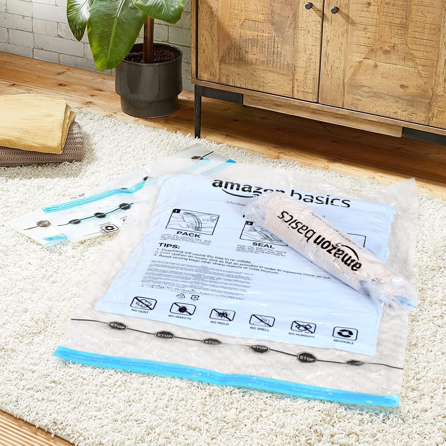 Detalle de Amazon Basics: Sac de rangement enroulables pour voyage (12 pièces) – 6 petits et 6 moyens, transparents