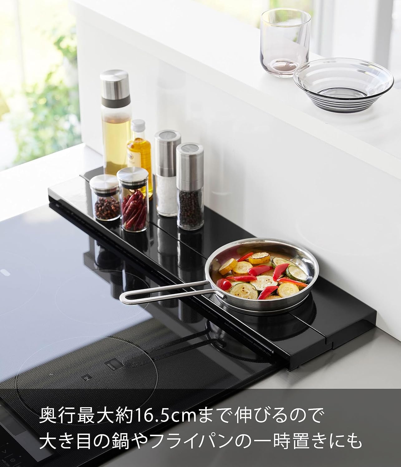 Detalle de 山崎実業 tower 4563 奥行伸縮排気口カバー 60cmコンロ用 ブラック・分解して水洗い可能