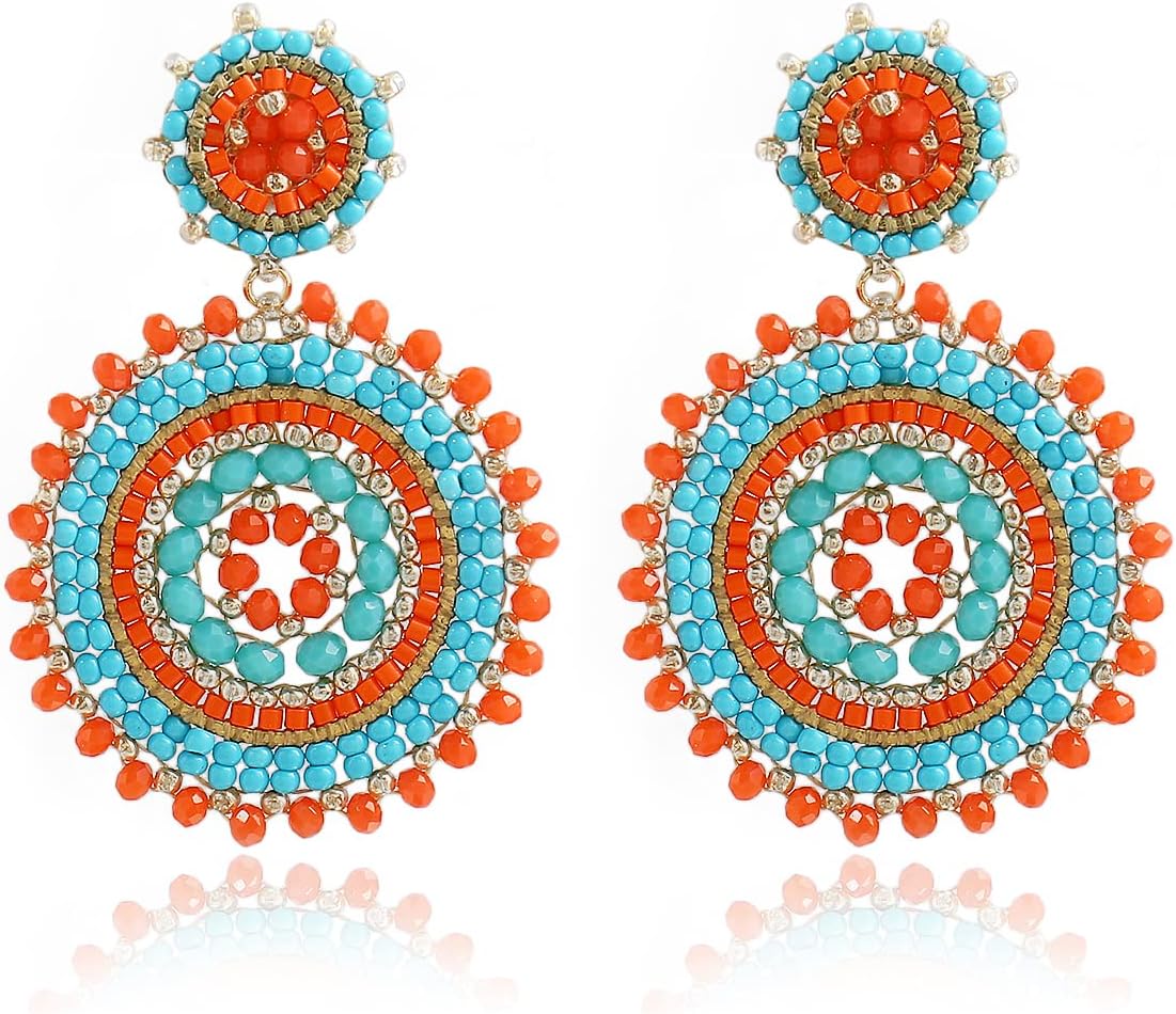 Detalle de Handgefertigte Damen-Perlenohrringe aus Rocailles & Hirseperlen mit Boho-Statement-Anhänger