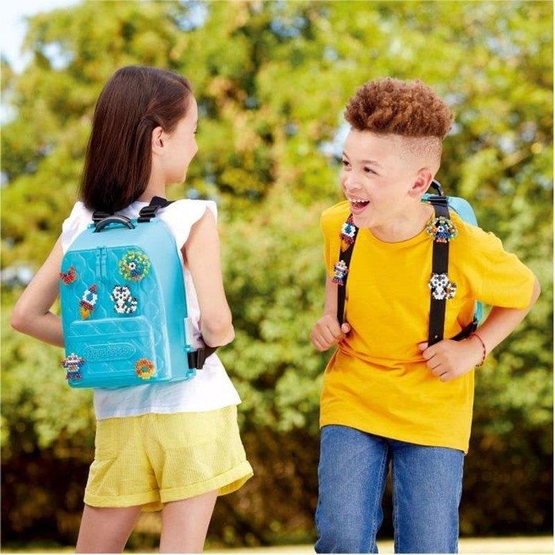 Thumbnail 1 de Kit Creativo Aquabeads Backpack DX 1000 Perlas: creatividad portátil para niños desde 4 años