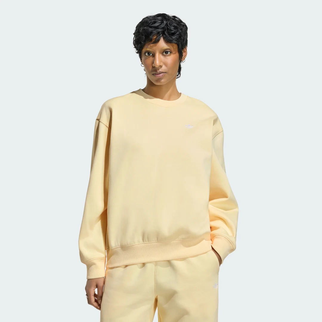 Imagen de Sudadera Essentials Crew Long Fleece OS de Adidas — Amarillo en OfertitasTOP