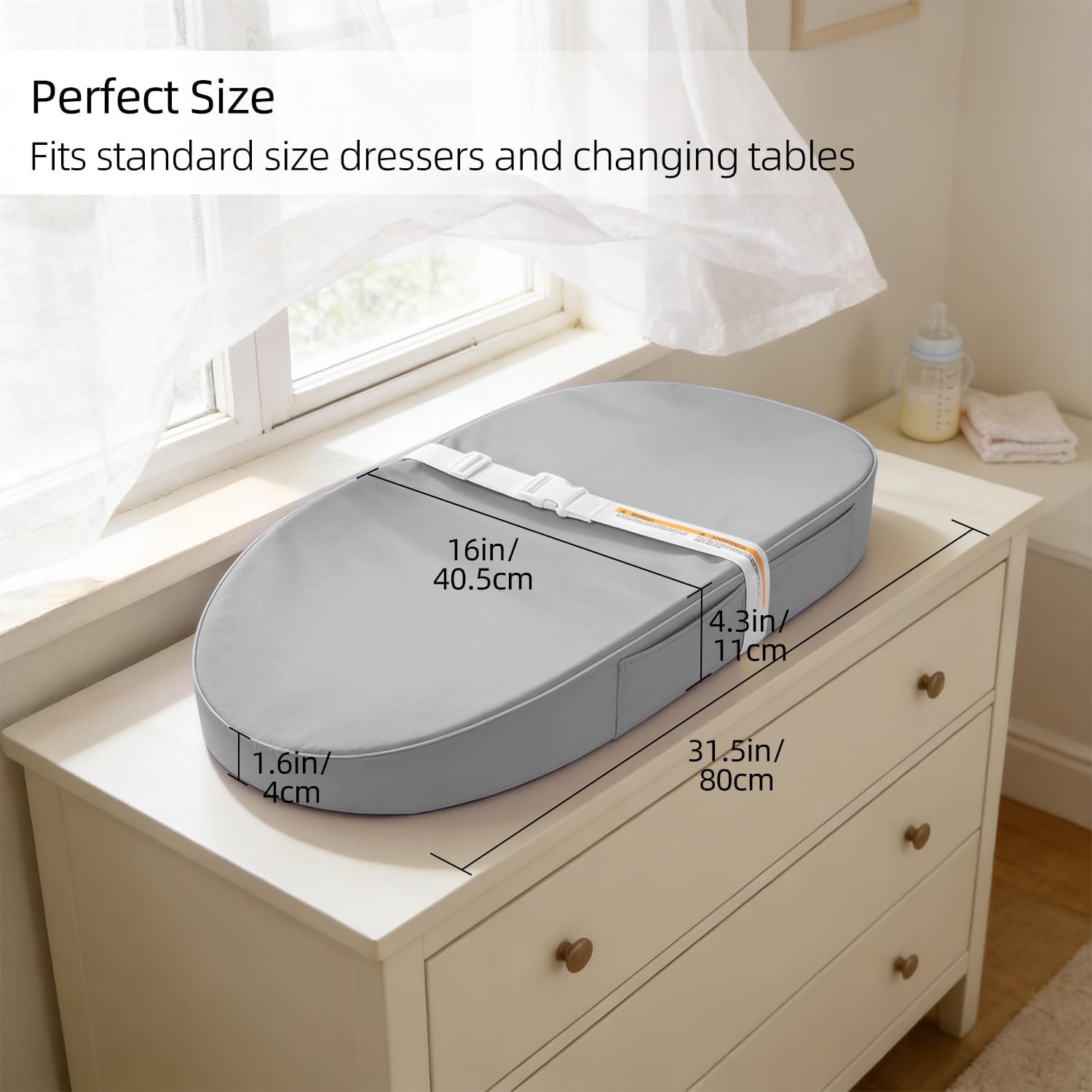 Detalle de JVEOO Waterproof Vegan Leather Baby Changing Pad with Safety Strap