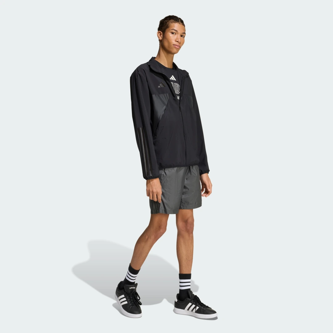 Detalle de CHAQUETA DEPORTIVA HOUSE OF TIRO de Adidas en Negro — versátil para deporte y tiempo libre