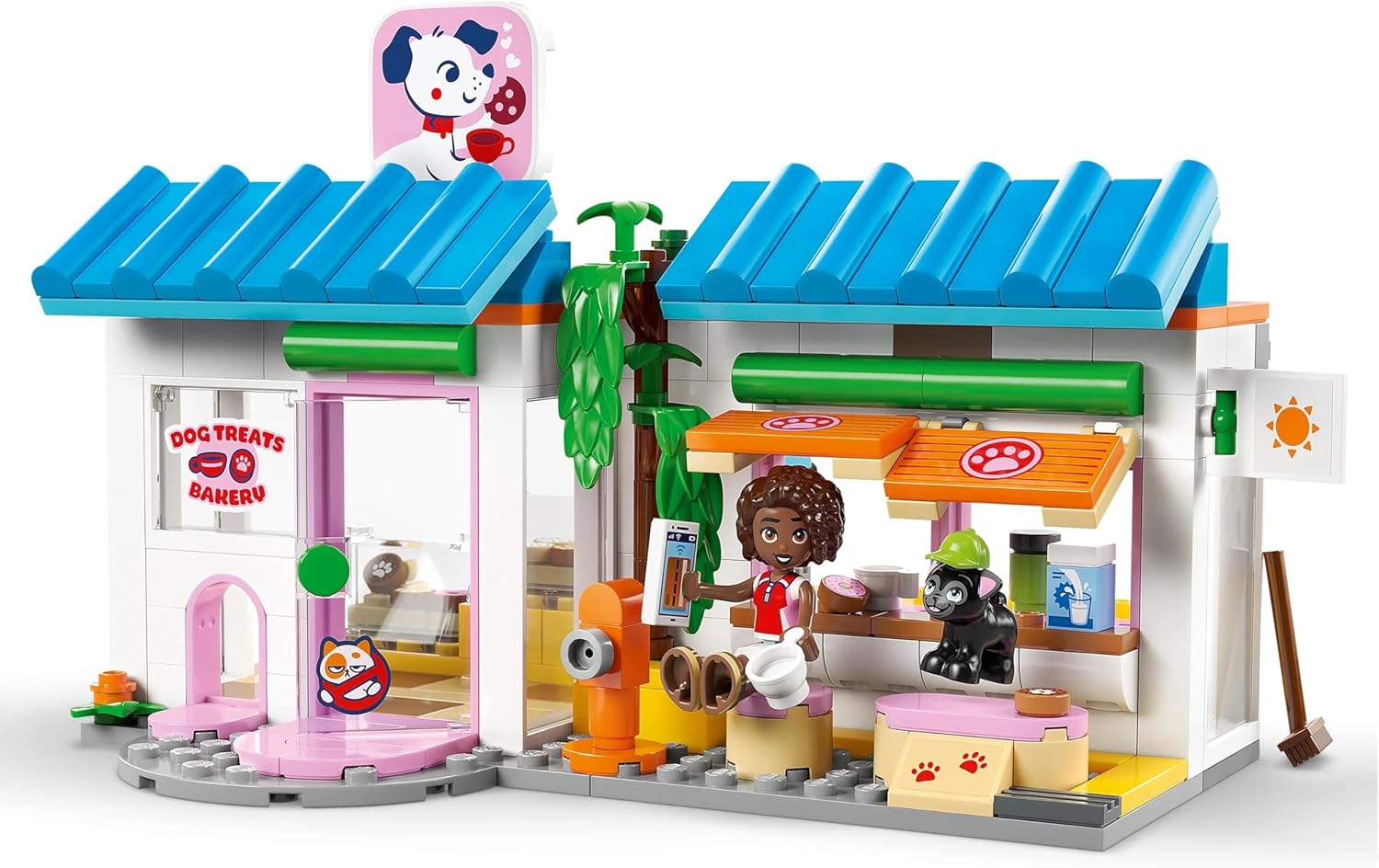 Detalle de LEGO Friends Hundekuchenbäckerei 42677 – Kinder-Einkaufsladen mit 2 Mini-Puppen, 4 Tierfiguren & Zubehör