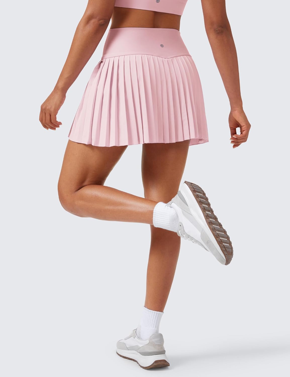 Detalle de CRZ YOGA gonna da tennis plissettata a vita alta con tasche e pantaloncini integrati