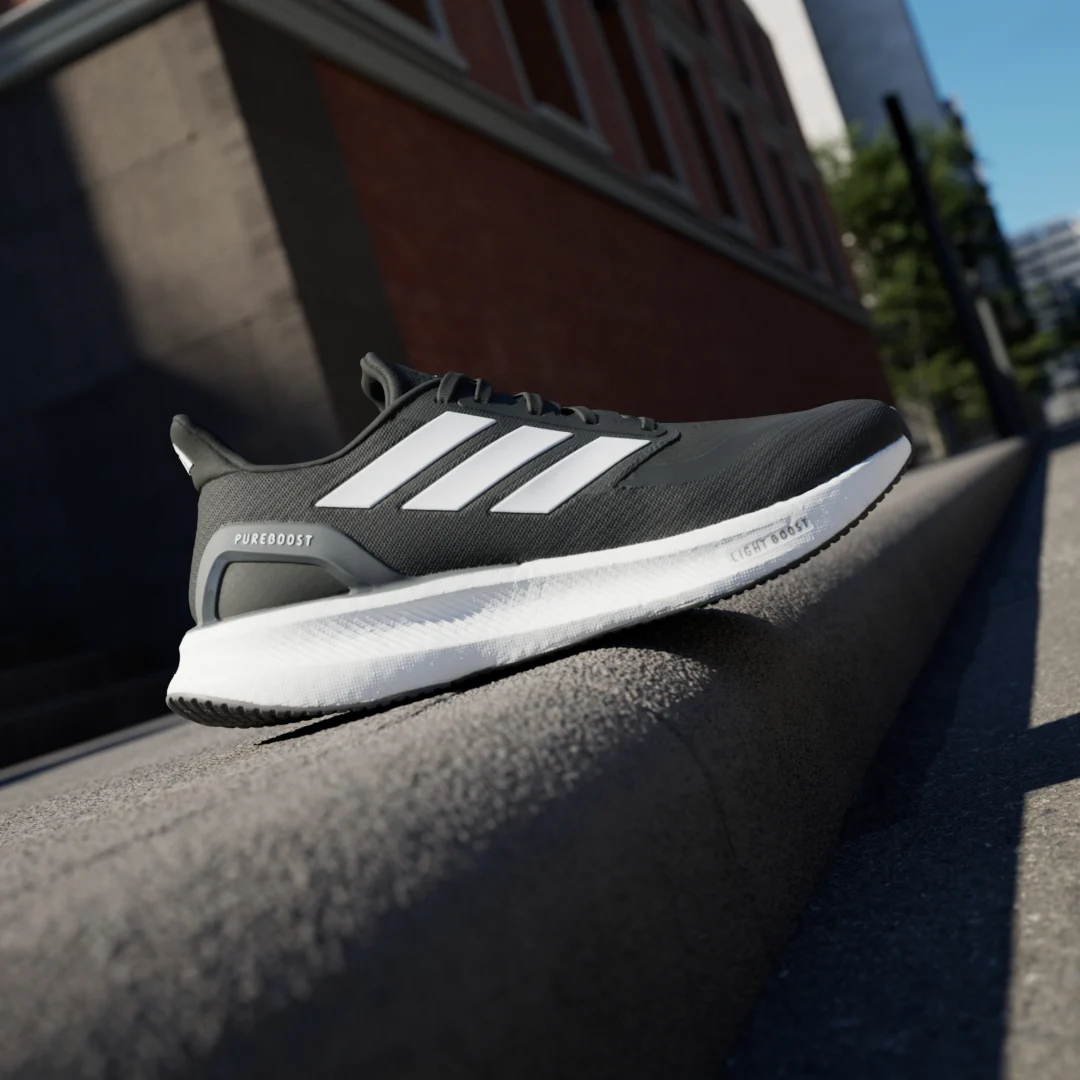 Detalle 2 de Zapatilla Pureboost 5 Running de Adidas en negro: comodidad y versatilidad para tus entrenos