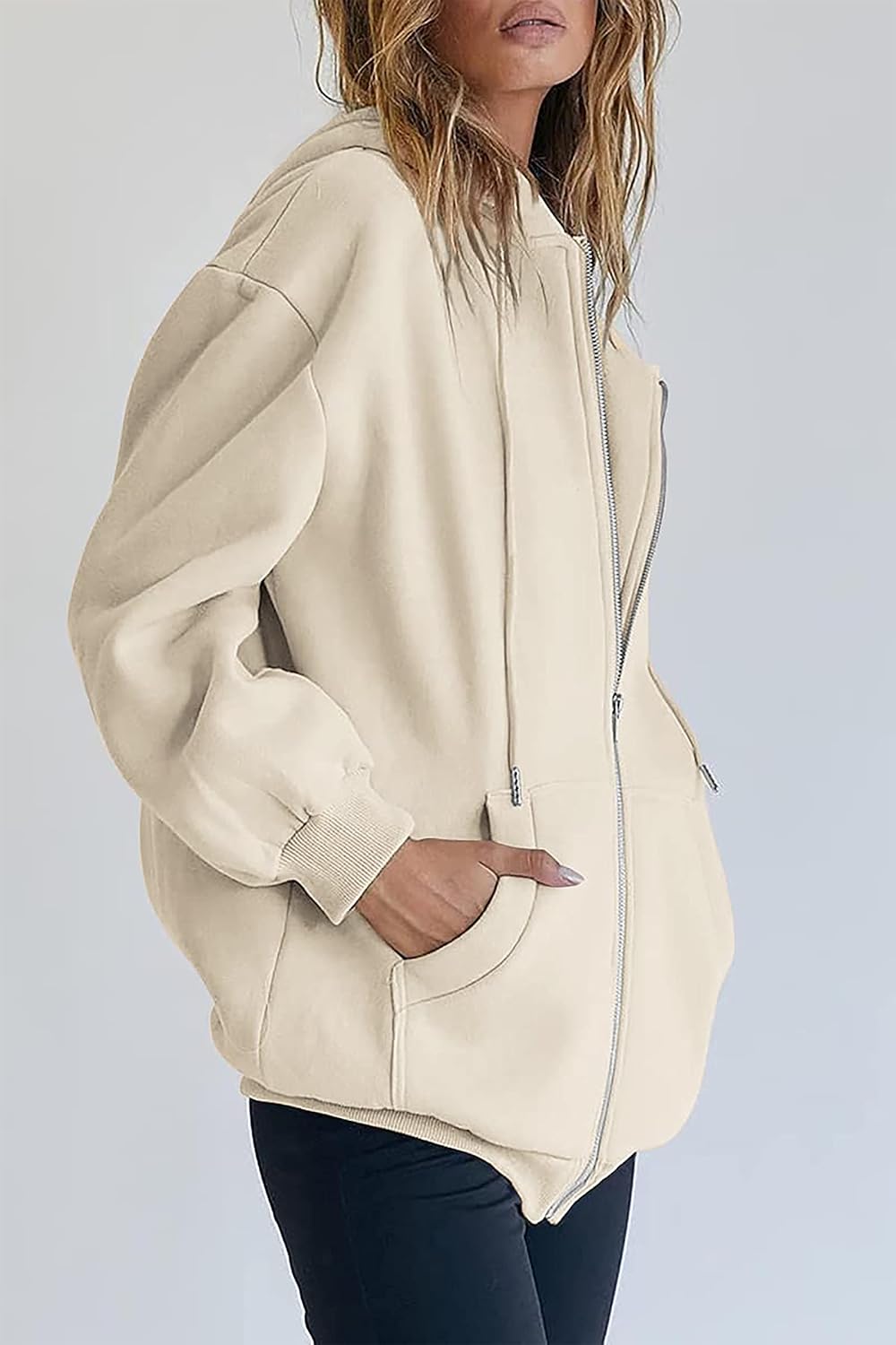 Detalle 2 de Timuspo damestrui met capuchon, lang oversized model met ritssluiting