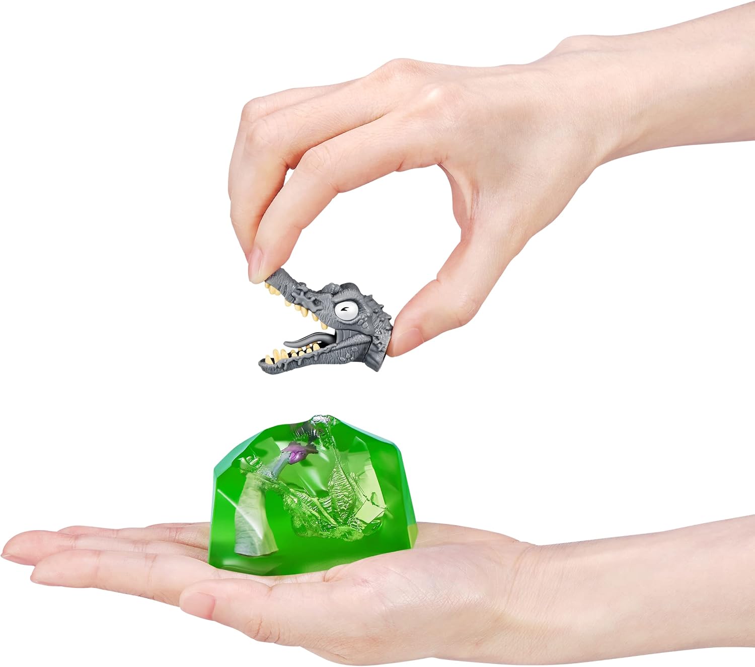 Detalle de Smashers Mini Jurassic Light-Up Dino Egg Spinosaurus Toy with Surprises