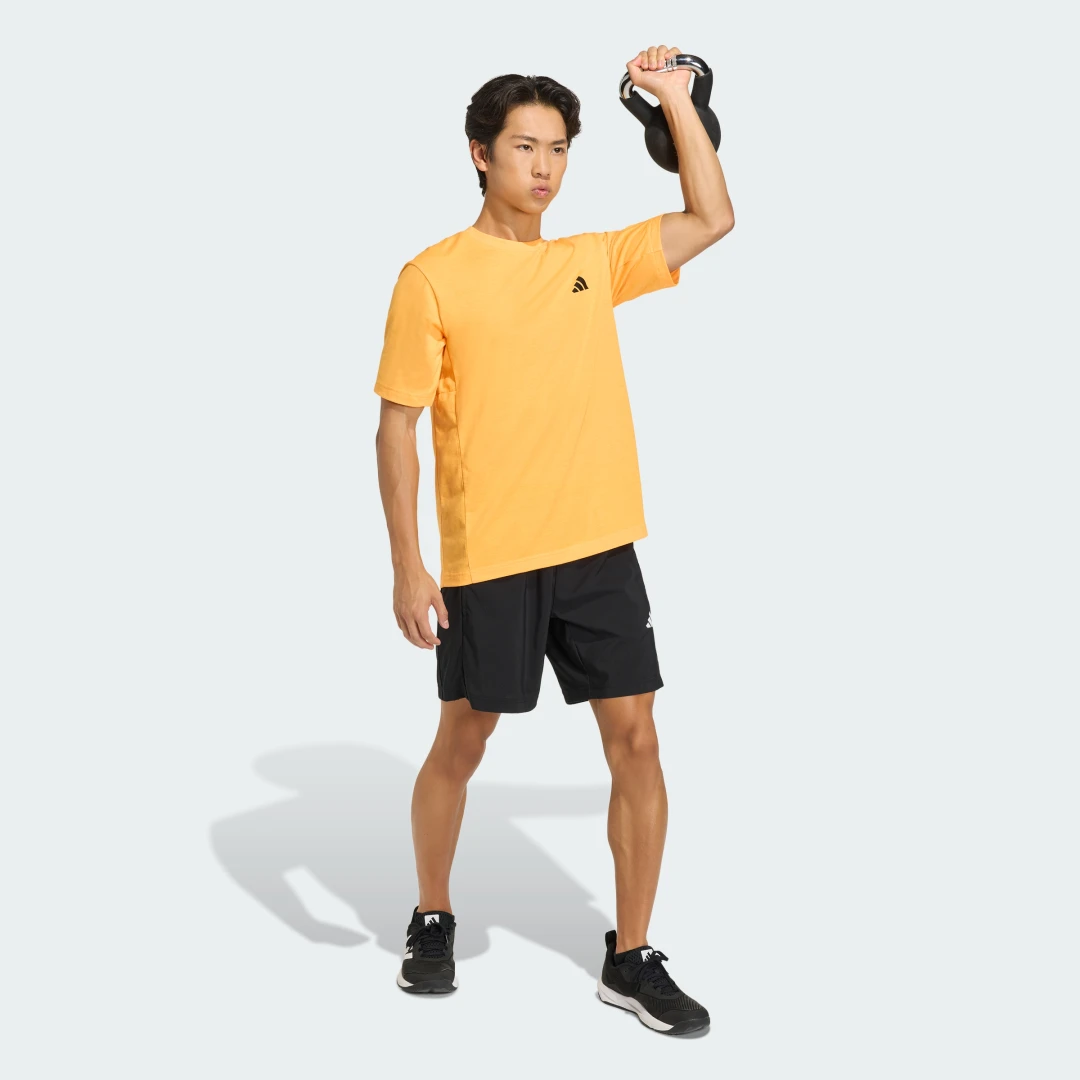 Detalle de Camiseta de Entrenamiento Essentials FeelReady de Adidas – naranja