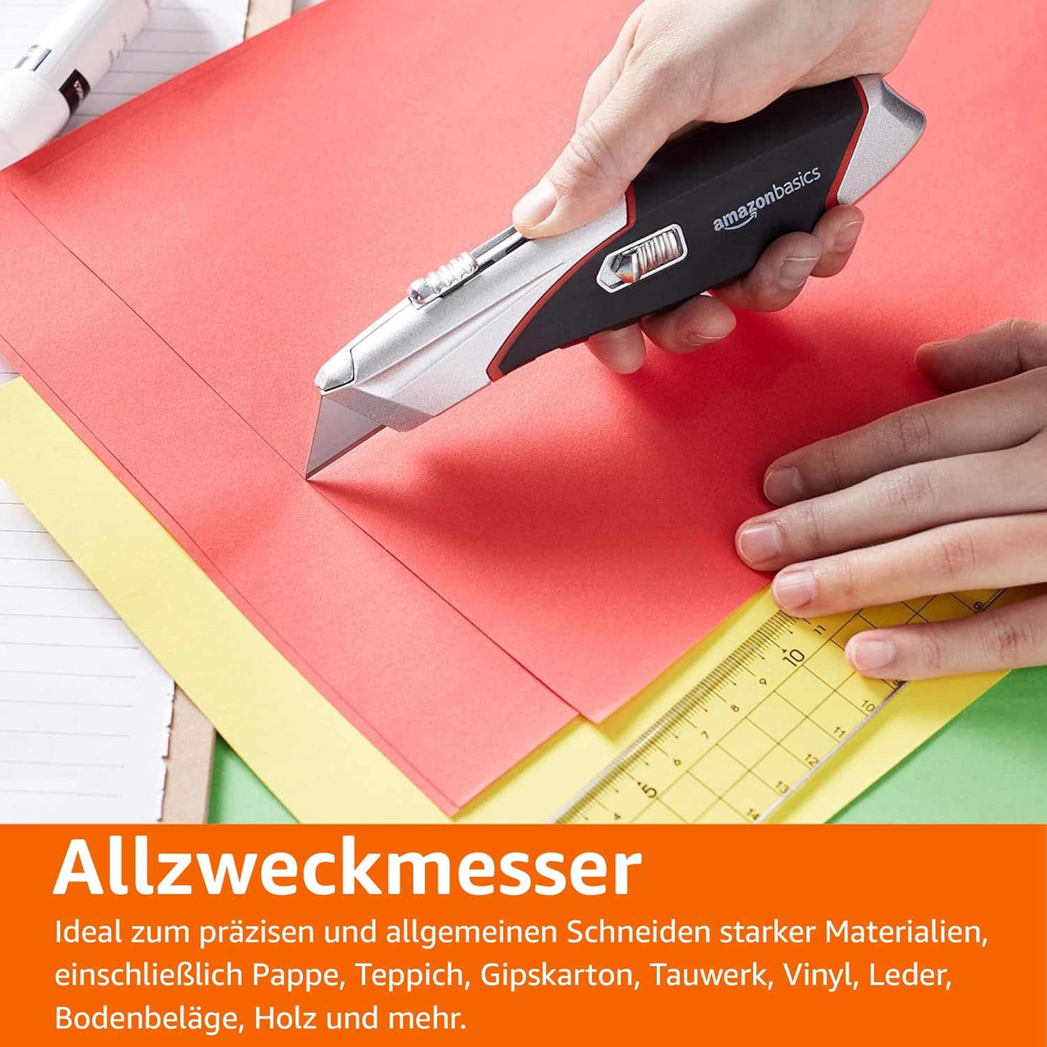 Detalle de Amazon Basics robustes, einziehbares Allzweckmesser mit automatischer Ladefunktion – 3 Positionen, 5 Klingen