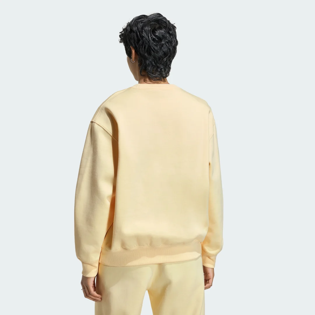Thumbnail 1 de Sudadera Essentials Crew Long Fleece OS de Adidas — Amarillo