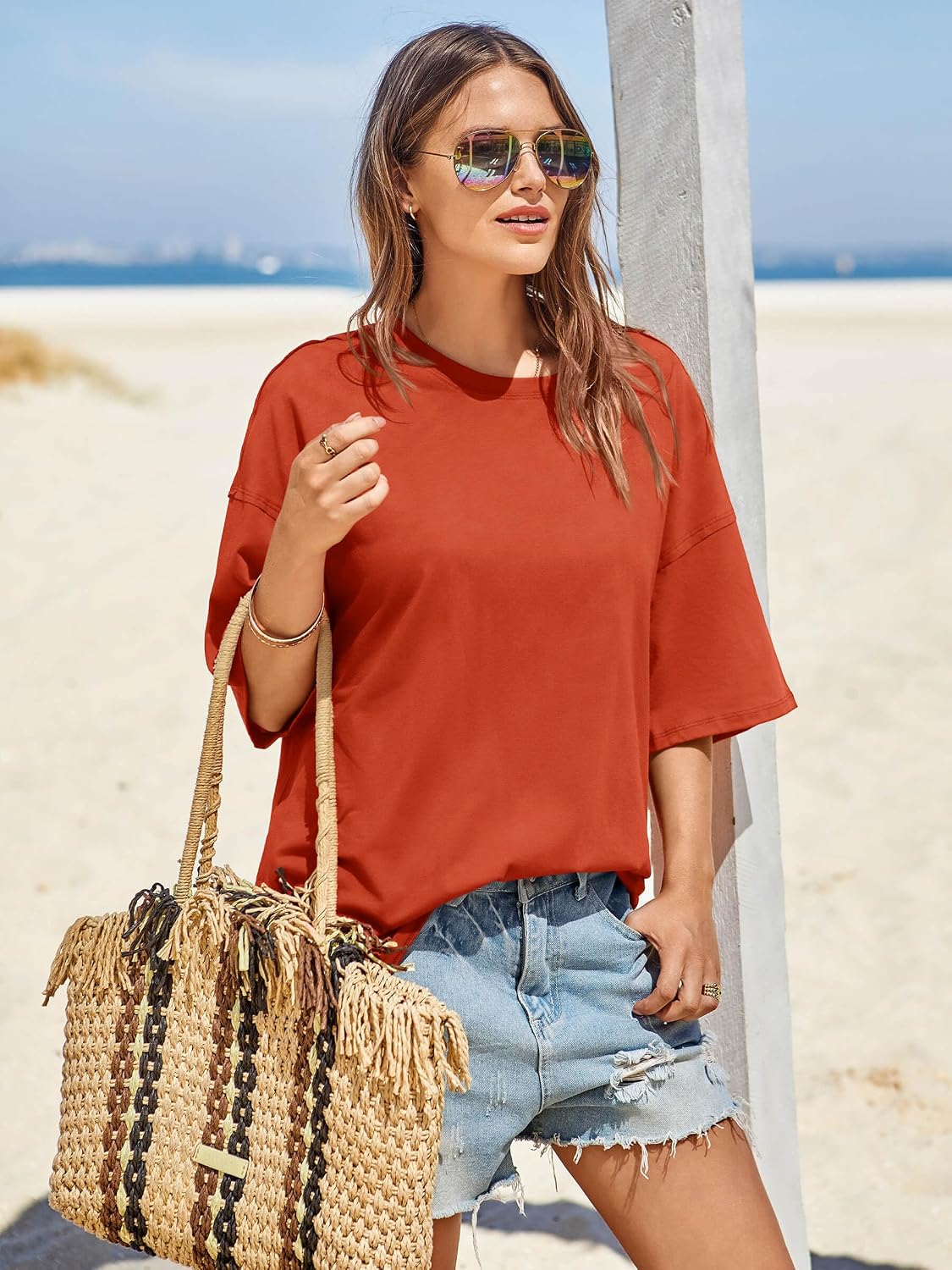 Detalle de Tankaneo Women's Oversized Summer T-Shirts: Loose Fit, Side Slit Tee