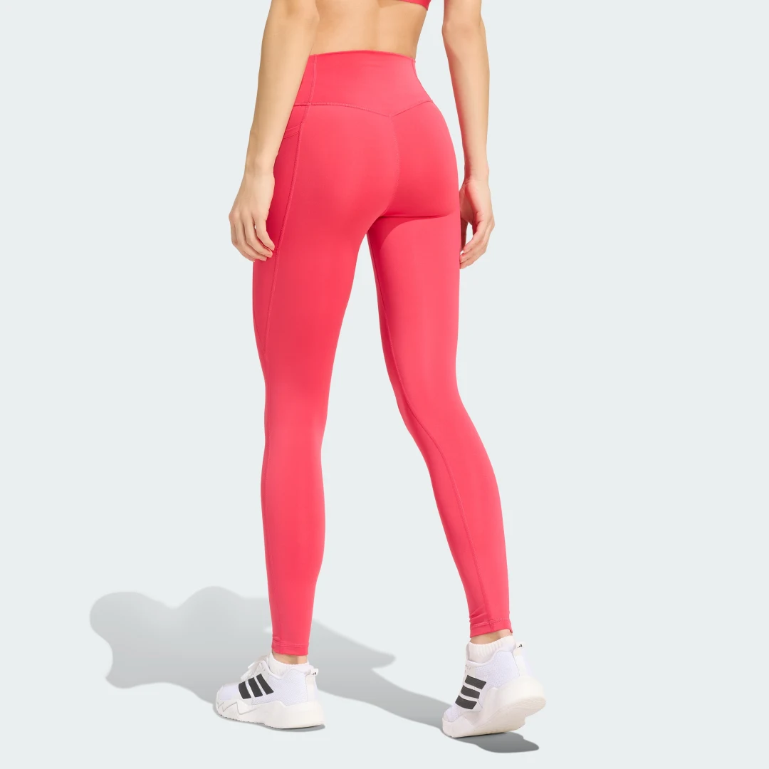 Detalle 2 de Mallas largas con bolsillo oculto Optimé Essentials de Adidas (color Rosa)