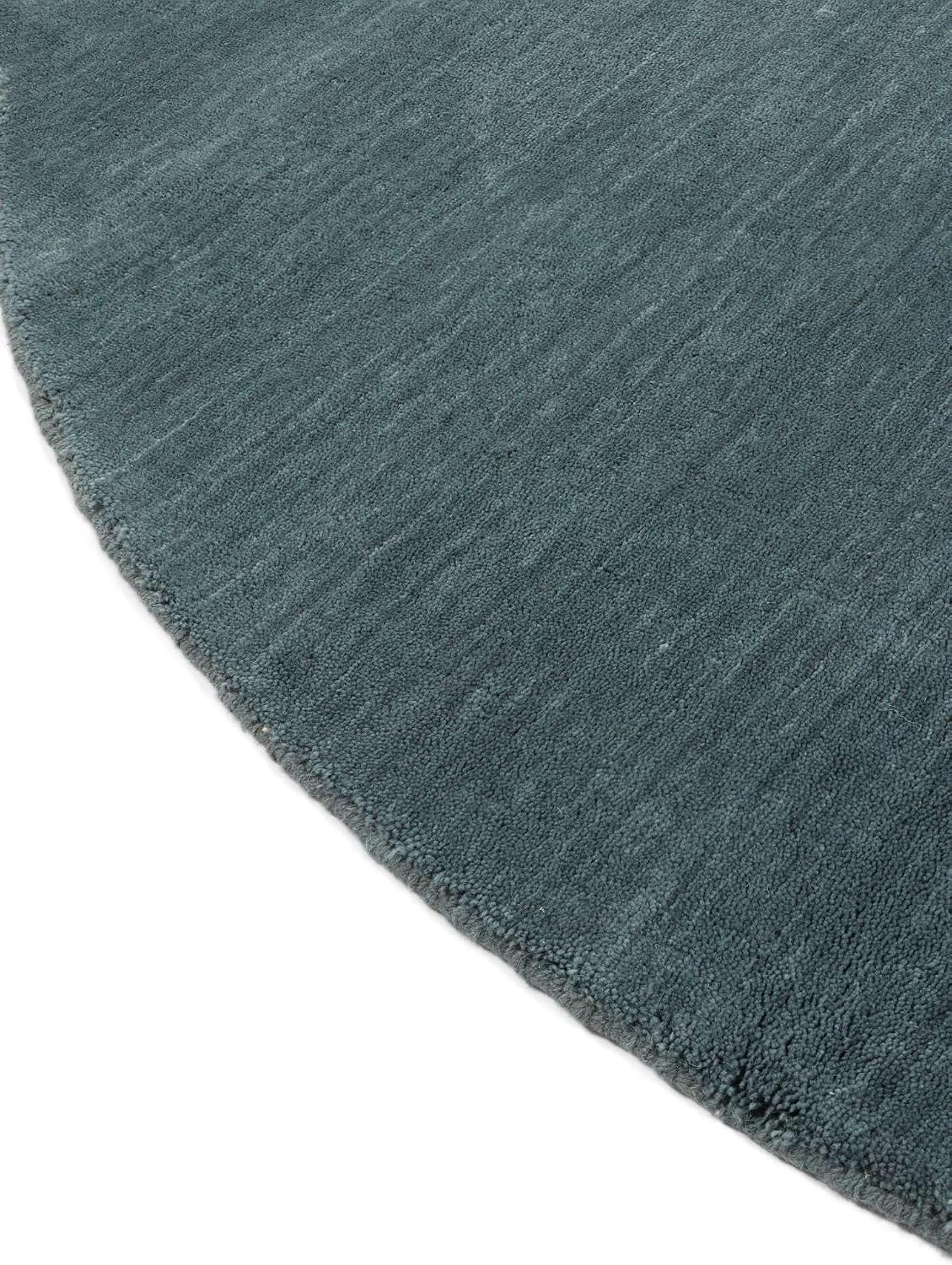 Detalle 2 de RugVista Handloom wollen rond vloerkleed Ø 150 cm, petrolblauw en handgemaakt