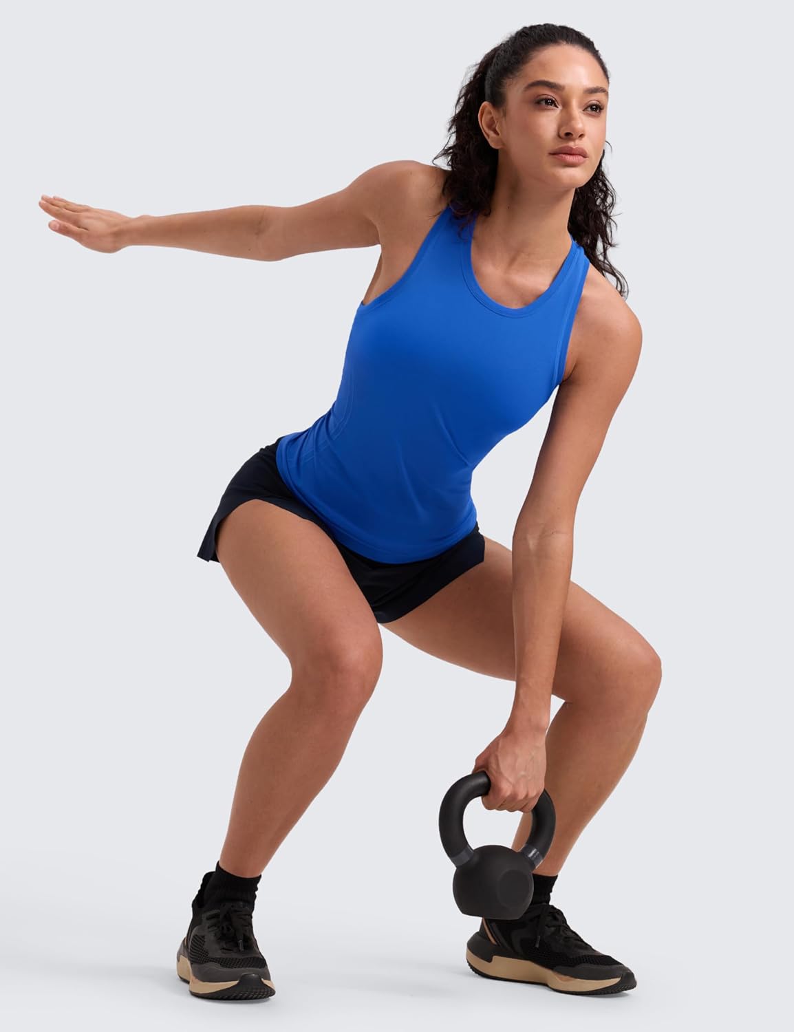 Detalle de CRZ YOGA débardeur sans couture pour femme à col haut et dos nageur, pensé pour la course et l’entraînement