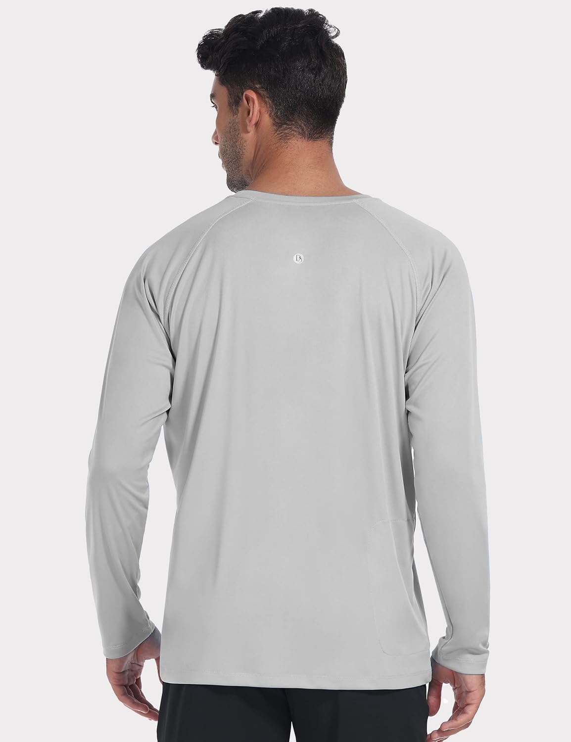 Detalle de Desol rashguard för män med fickor, UPF 50+ och lång ärm