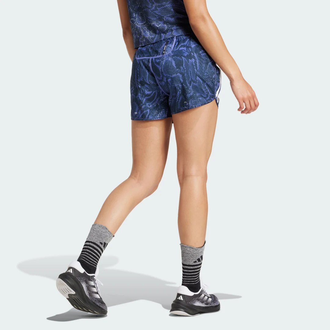 Detalle 2 de Pantalón corto Own the Run Excite Allover Print AEROREADY de Adidas