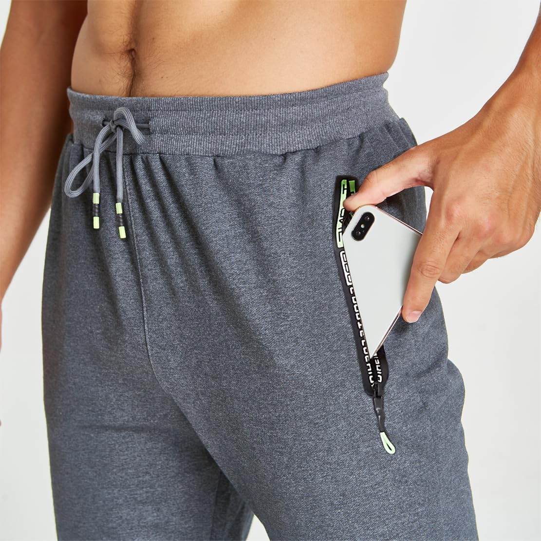 Detalle de ZOXOZ pantaloni sportivi uomo in cotone con elastico in vita e tasche con zip
