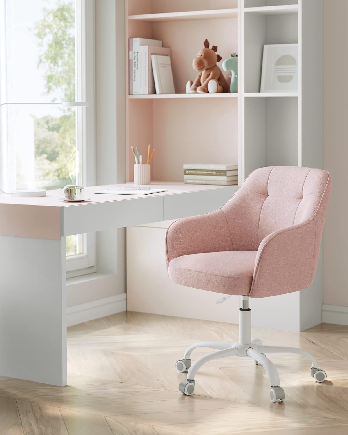 Detalle de Sedia da studio girevole SONGMICS con altezza regolabile, portata 110 kg e tessuto cotone-lino rosa OBG019P01