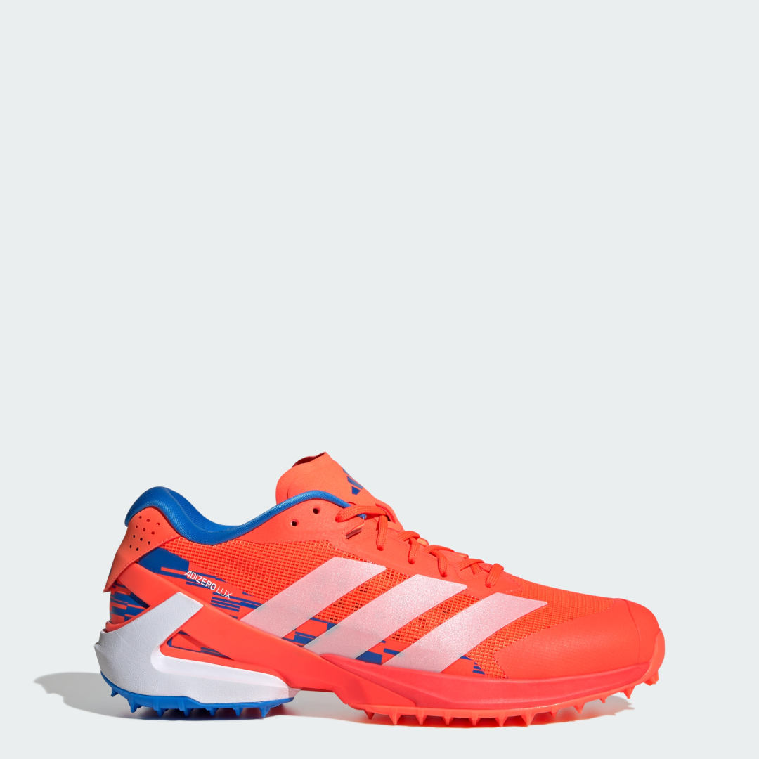 Detalle de Adidas Adizero Lux 3: Bota de hockey sobre hierba en naranja