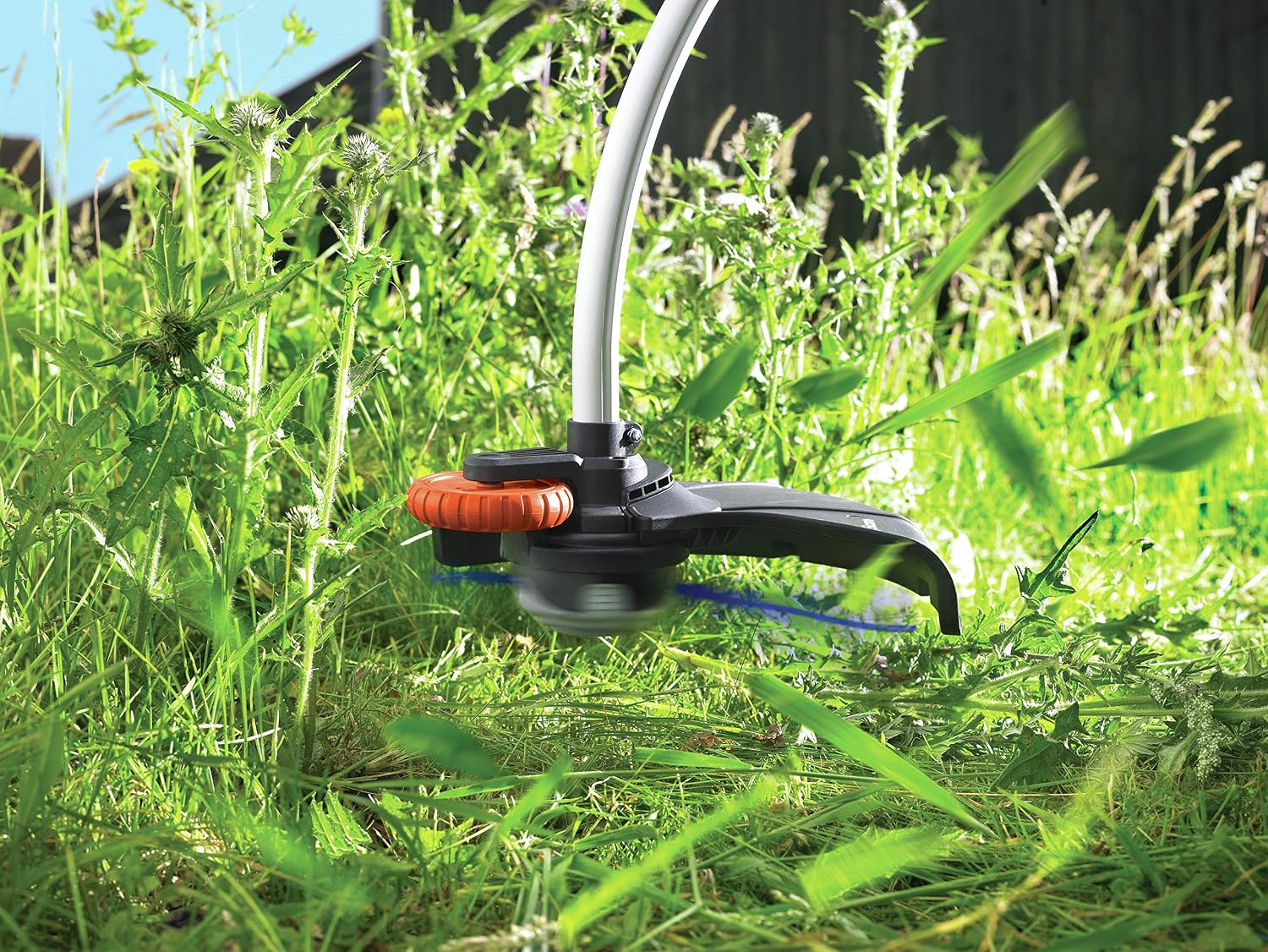 Detalle de BLACK+DECKER Coupe-bordures filaire 900W GL9035-QS – 35 cm, manche télescopique et roue de guidage